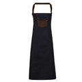 Indigo-Brown Denim - Front - Premier Unisex Adults Division Waxed Look Faux Leather Denim Bib Apron